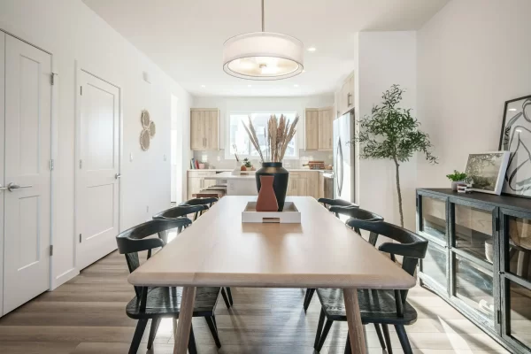 contemporary dining room with off white painted walls
